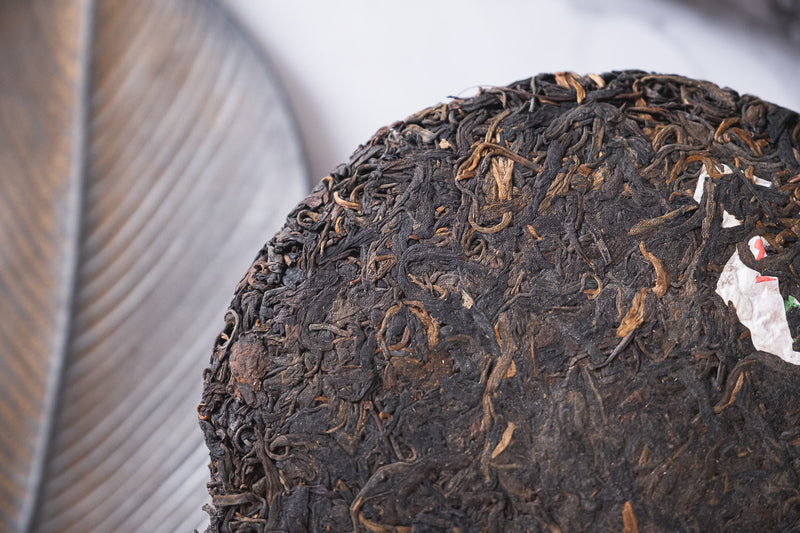 2004 Yunnan Import and Export Corporation 8582 Raw Pu-erh Tea Cake